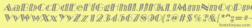 Fonte MarqueeflashItalic – fontes cinzas em um fundo amarelo