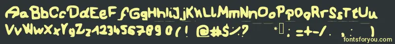 OurFirstKiss Font – Yellow Fonts on Black Background