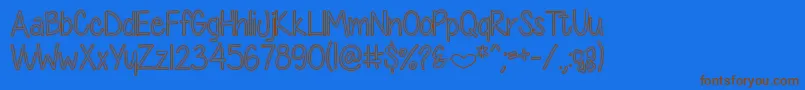 DiamondGirlHollow Font – Brown Fonts on Blue Background