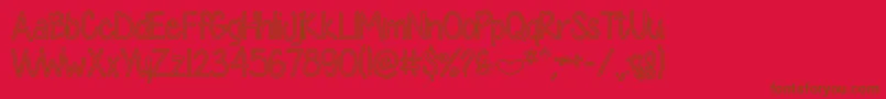 DiamondGirlHollow-fontti – ruskeat fontit punaisella taustalla