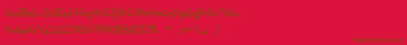 FancyFootwork2-Schriftart – Braune Schriften auf rotem Hintergrund