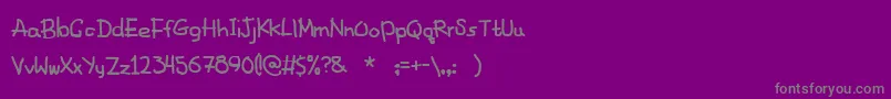 FancyFootwork2-fontti – harmaat kirjasimet violetilla taustalla