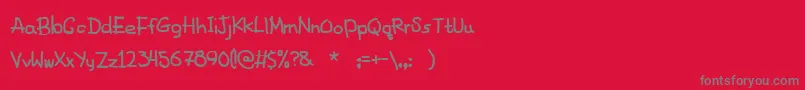 FancyFootwork2-fontti – harmaat kirjasimet punaisella taustalla