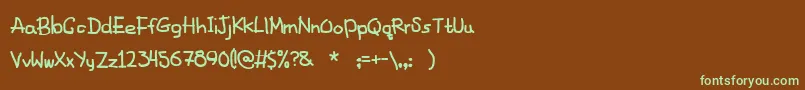 フォントFancyFootwork2 – 緑色の文字が茶色の背景にあります。