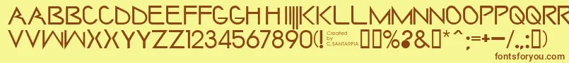 フォントSaintharpy – 茶色の文字が黄色の背景にあります。