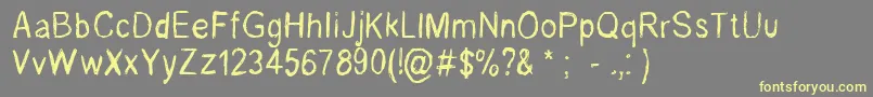 RenelevesqueRegular Font – Yellow Fonts on Gray Background