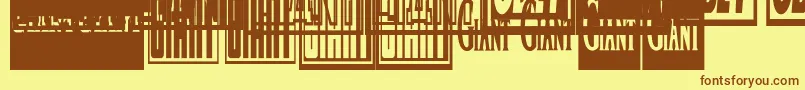 フォントObeygiantpostercondensed – 茶色の文字が黄色の背景にあります。