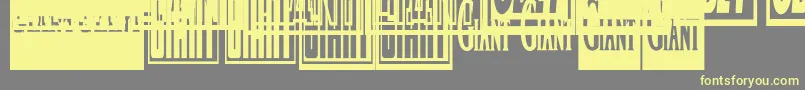 Obeygiantpostercondensed Font – Yellow Fonts on Gray Background