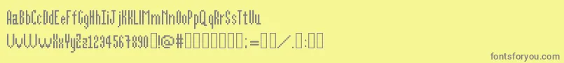 フォントAlittlebit – 黄色の背景に灰色の文字
