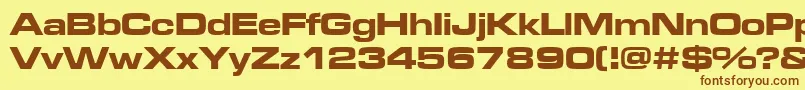 Microgrammadbolext Font – Brown Fonts on Yellow Background
