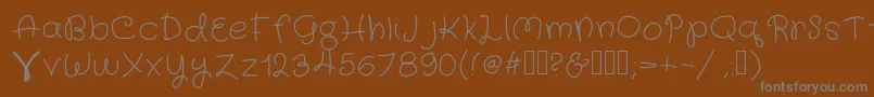 フォントFairyWings – 茶色の背景に灰色の文字