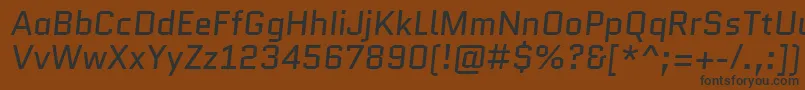 Fonte QuanticoItalic – fontes pretas em um fundo marrom