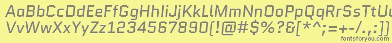 QuanticoItalic-Schriftart – Graue Schriften auf gelbem Hintergrund