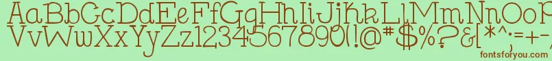 Fonte DjbHollySerif – fontes marrons em um fundo verde