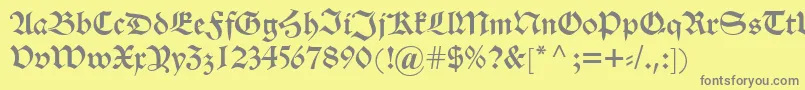 フォントAlteschwabacher – 黄色の背景に灰色の文字