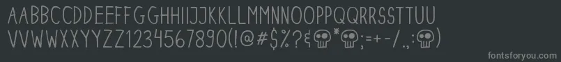 フォントDinskiCasualCondensed – 黒い背景に灰色の文字