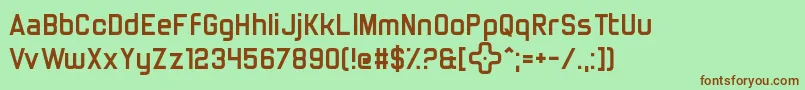 TrulyMadlyDpad Font – Brown Fonts on Green Background