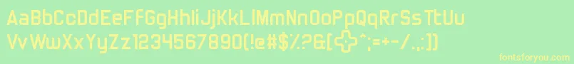 TrulyMadlyDpad Font – Yellow Fonts on Green Background