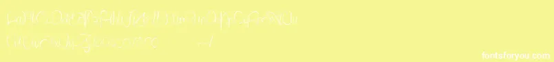 フォントLantreDuCaniche – 黄色い背景に白い文字