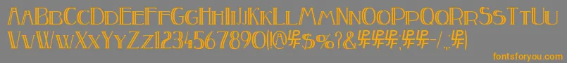 フォントPeakeDoubled – オレンジの文字は灰色の背景にあります。