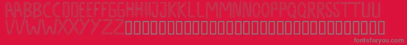DesigndesignRegular Font – Gray Fonts on Red Background