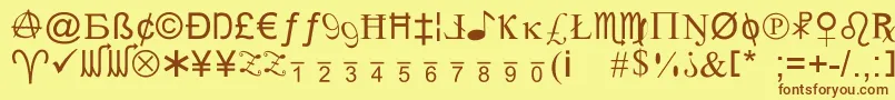 フォントXcrypt – 茶色の文字が黄色の背景にあります。