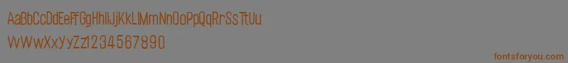 フォントCflabellehelenepRegular – 茶色の文字が灰色の背景にあります。