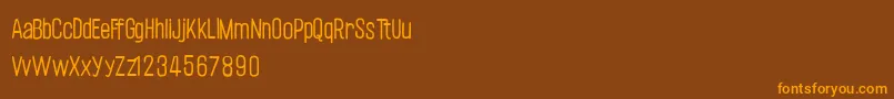 Czcionka CflabellehelenepRegular – pomarańczowe czcionki na brązowym tle