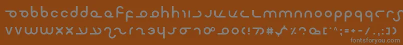 フォントMasterdom – 茶色の背景に灰色の文字