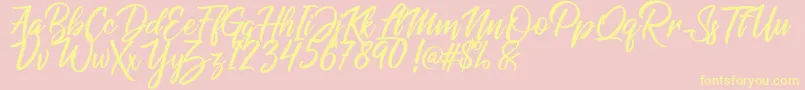 Raphlanokfuture-Schriftart – Gelbe Schriften auf rosa Hintergrund