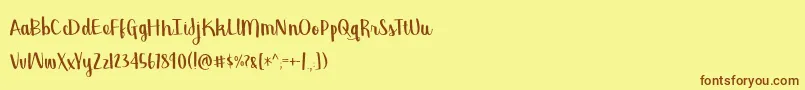 BmdGeorgina Font – Brown Fonts on Yellow Background