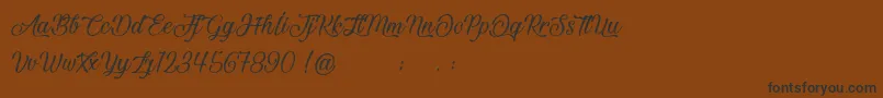 BeautifulAndOpenhearted-fontti – mustat fontit ruskealla taustalla