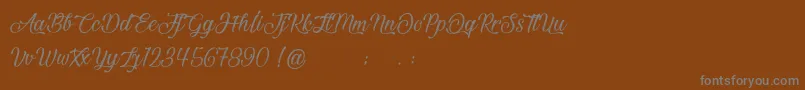 フォントBeautifulAndOpenhearted – 茶色の背景に灰色の文字