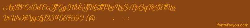 フォントBeautifulAndOpenhearted – オレンジ色の文字が茶色の背景にあります。