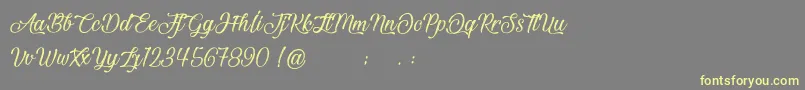 BeautifulAndOpenhearted-Schriftart – Gelbe Schriften auf grauem Hintergrund