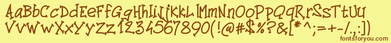 Pwcomics Font – Brown Fonts on Yellow Background