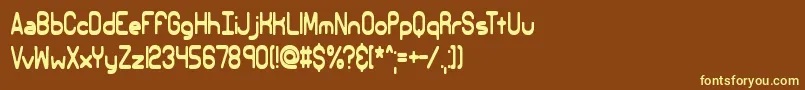 Elsewhe2-fontti – keltaiset fontit ruskealla taustalla
