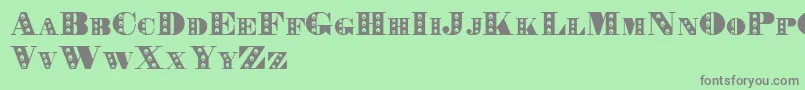 フォントRechnung – 緑の背景に灰色の文字