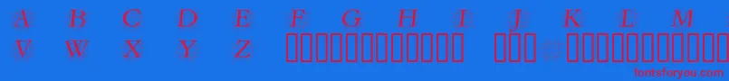 GrafobliqueItalic-fontti – punaiset fontit sinisellä taustalla