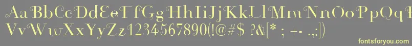 Rousseau Font – Yellow Fonts on Gray Background