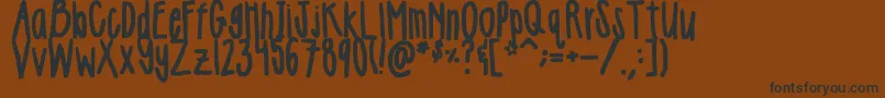 Шрифт Girlie – чёрные шрифты на коричневом фоне