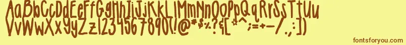 Girlie-Schriftart – Braune Schriften auf gelbem Hintergrund