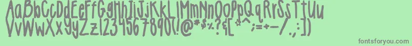 Girlie Font – Gray Fonts on Green Background