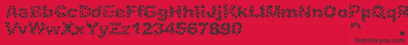 Alphabet05-Schriftart – Schwarze Schriften auf rotem Hintergrund