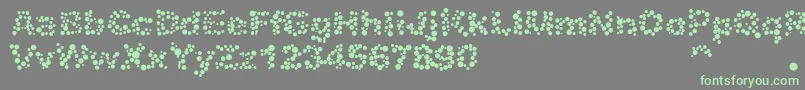 Weitere Informationen zur Alphabet05-Schriftart Alphabet05-Schriftart – Grüne Schriften auf grauem Hintergrund