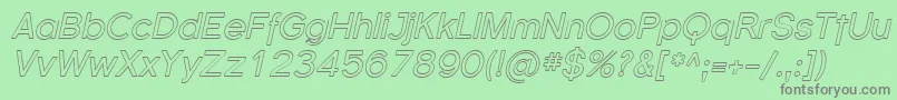 Fonte FlorencesansOutlineItalic – fontes cinzas em um fundo verde