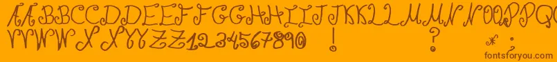 Czcionka JmhPaulaSm – brązowe czcionki na pomarańczowym tle