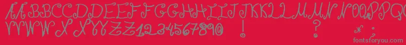フォントJmhPaulaSm – 赤い背景に灰色の文字