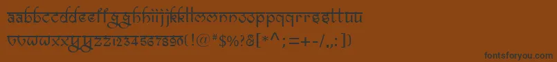 フォントBitlingravish – 黒い文字が茶色の背景にあります