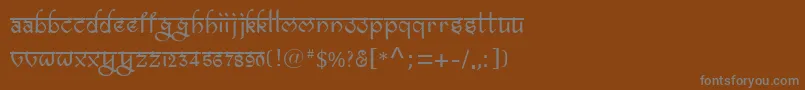 フォントBitlingravish – 茶色の背景に灰色の文字